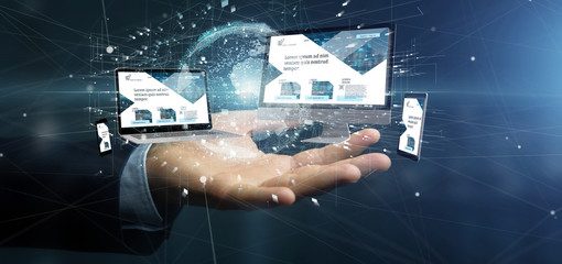 Wall Mural - businessman holding a devices connected to a global business network 3d rendering