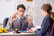 © Elnur - Lawyer talking to client in office