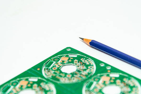 Electronic product design concept,printed circuit board(PCB) include pencil 2B with isolated white background,PCB