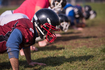 Wall Mural - american football team doing push ups