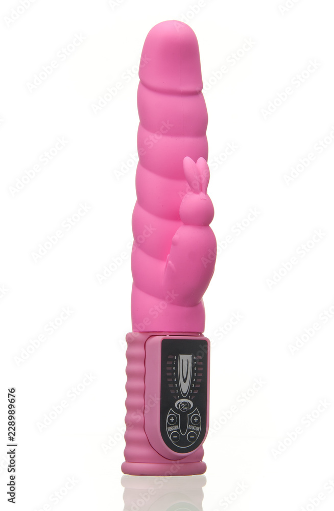 Pink Vibrator dildo on a white background Stock Photo