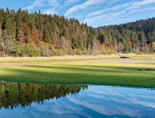 Canvas Print - autumn color mountain landscape and lake in the Swiss Alps