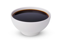 A tasty black soy sauce in bowl isolated on white background