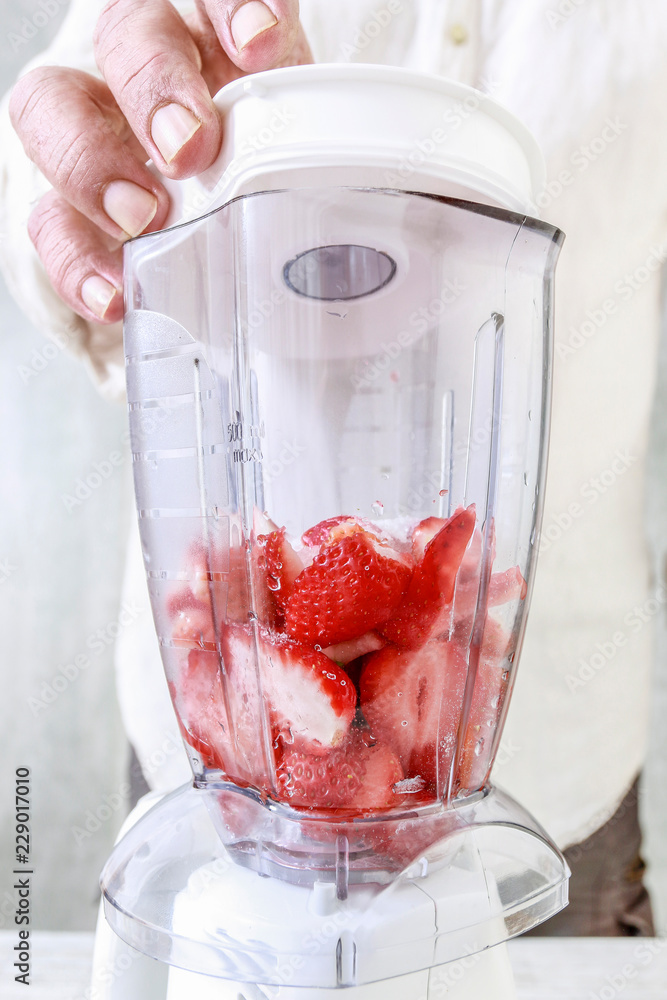 How to make fruit smoothie using blender, tutorial. Stock Photo | Adobe ...
