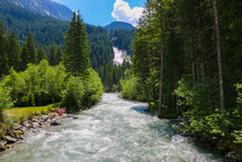 View Alpine Inspiring Krimml Waterfall In Mountains In Summer Day. Trekking In National Park Hohe Tauern, Austria