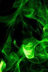 Green smoke on black background