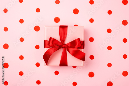 Gift box with red bow.