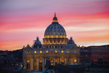 Fototapeta Londyn - The Papal Basilica of St. Peter in the Vatican at sunset in the evening, Rome
