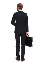 Back View Of Young Blonde Businessman Waiting For Job Interview