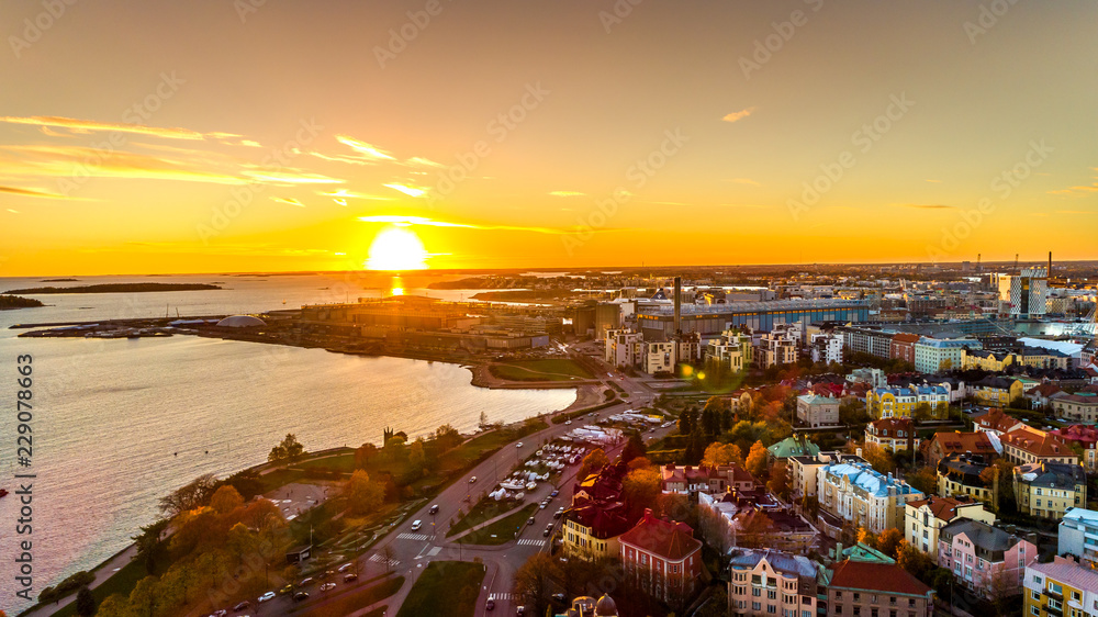 Obraz na płótnie Aerial sunset view of beautiful city Helsinki . Colorful sky and colorful buildings. Helsinki, Finland. w salonie
