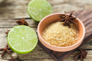 Wall Mural - brown sugar and lemon on the table