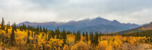 Alaska Mountains Landscape Nature Background In Autumn Fall Season. Snow Peaks Banner Panorama.