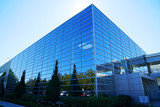 Fototapeta  - close up on modern company building exterior with blue glass