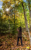 Fototapeta Nowy Jork - Photographer in Autumn