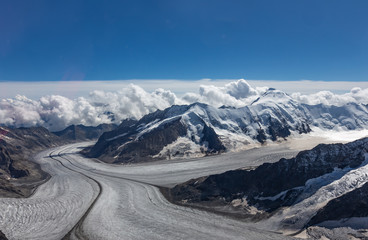 view of the glacier from the peak of the swiss alps