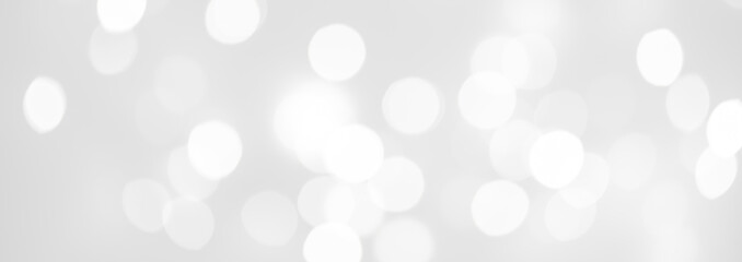 Wall Mural - elegant abstract silver christmas background with white bokeh lights for holiday poster, banner, ad,