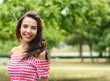 © Pixel-Shot - Happy young woman resting in park