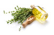 © Pixel-Shot - Bottle of essential oil with pills and thyme on white background