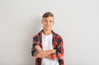 © Pixel-Shot - Confident teenage boy on white background
