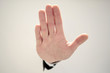 © ASDF - close up. businessman showing a gesture of victory.