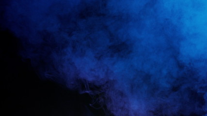 blue bomb smoke on black background
