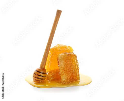 Fresh honeycomb with dipper on white background Poster Mural XXL