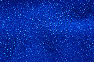 Wall Mural - water drops abstract blue background