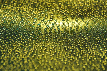 Wall Mural - water drops abstract festive gold yellow background