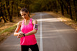 © BGStock72 - Female runner during outdoor workout in beautiful mountain nature landscape