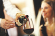 © Minerva Studio - Waiter pouring wine