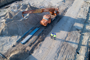 Top view of engineers at construction site