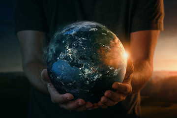 Wall Mural - planet earth in human hands. elements of this image furnished by nasa