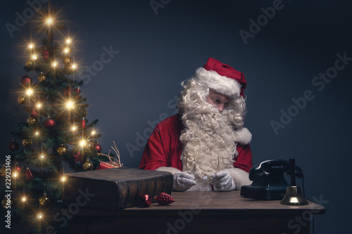 Xmas Weihnachtsmann Wartet Auf Einen Anruf Mit Klarem Hingerund Telefon Buch Und Weihnachtsbaum Buy This Stock Photo And Explore Similar Images At Adobe Stock Adobe Stock