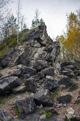 Untreated rough natural gray stone in everyday environment
