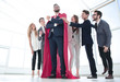 © ASDF - boss is a superhero and the business team is standing together