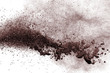 Dry soil explosion on white background.