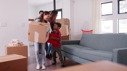 Wall Mural - Family Carrying Removal Boxes Into New Home On Moving Day