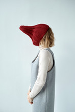Woman Hiding Face With Knit Hat