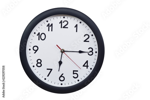 Time concept with black clock at a quarter past six: comprar esta foto