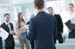 © ASDF - image is blurred.the Manager makes a report to the business team.
