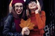 © opolja - Outdoors fashion portrait young pretty best girls friends in friendly hug. Walking at the city. Posing at the street. Wearing stylish outerwear and hats. Bright make up. Positive emotions.