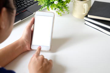 Closeup hand using mockup smartphone.