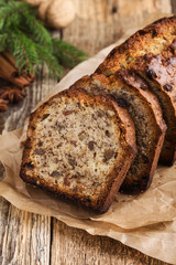 Wall Mural - Baked Christmas loaf cake on wooden board