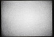 © nejuras - black and white photographic film frame background with heavy grain and light leak