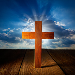 Wall Mural - Christian wood cross on blue sky wooden