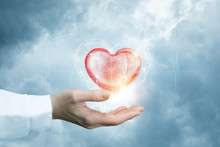 A Bright Red Heart Is Flying Above The Doctor's Hand With The Slight Cardiac Waveforms .