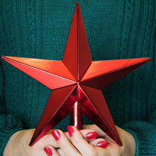 Christmas Red Star For Tops Chistmas Tree In Women Hand. JOY. Decor For Cristmas Tree.