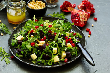 Wall Mural - Fresh salad of arugula, beet and cheese.