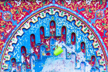 Wall Mural - Public colorful fountain in blue medina of the Chefchaouen, Morocco in Africa