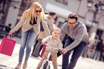 Happy family in city